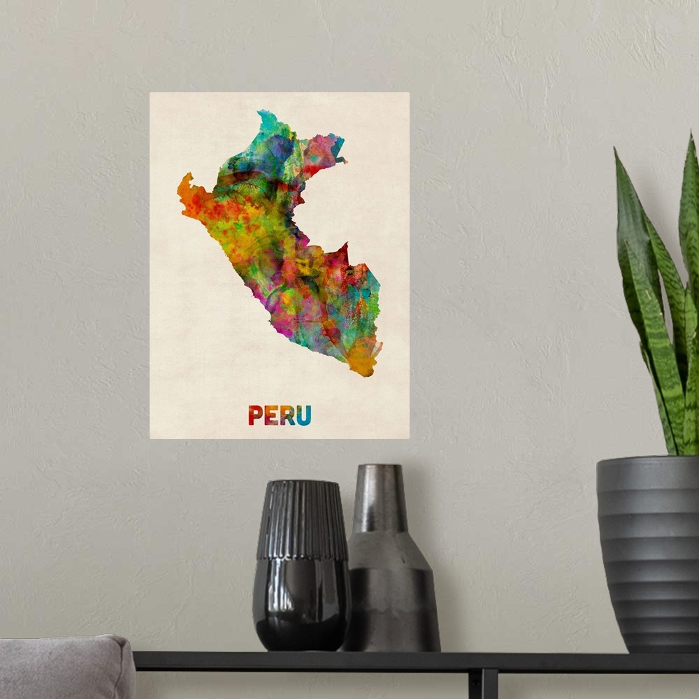 A modern room featuring Contemporary piece of artwork of a map of Peru made up of watercolor splashes.