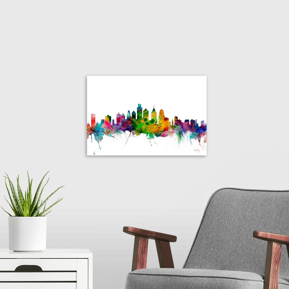 A modern room featuring Contemporary piece of artwork of the Philadelphia skyline made of colorful paint splashes.