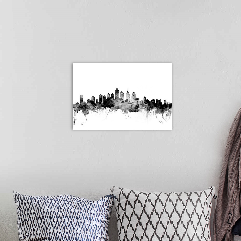 A bohemian room featuring Contemporary artwork of the Philadelphia city skyline in black watercolor paint splashes.