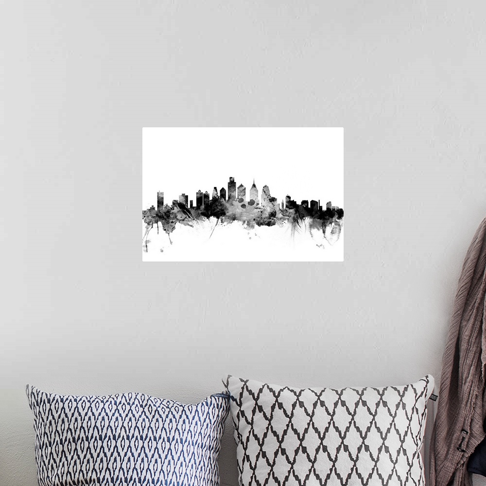 A bohemian room featuring Contemporary artwork of the Philadelphia city skyline in black watercolor paint splashes.