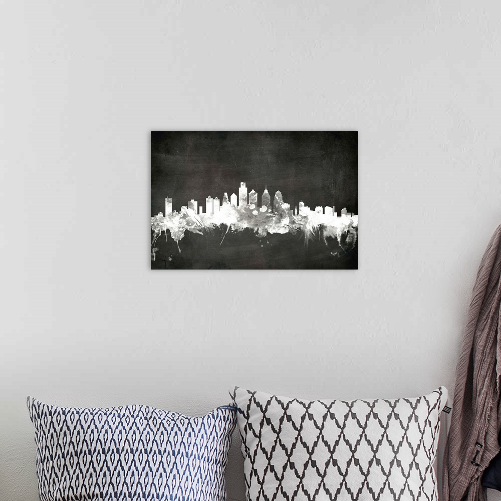 A bohemian room featuring Smokey dark watercolor silhouette of the Philadelphia city skyline against chalkboard background.