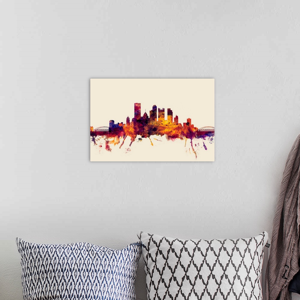 A bohemian room featuring Watercolor artwork of the Pittsburgh skyline against a beige background.