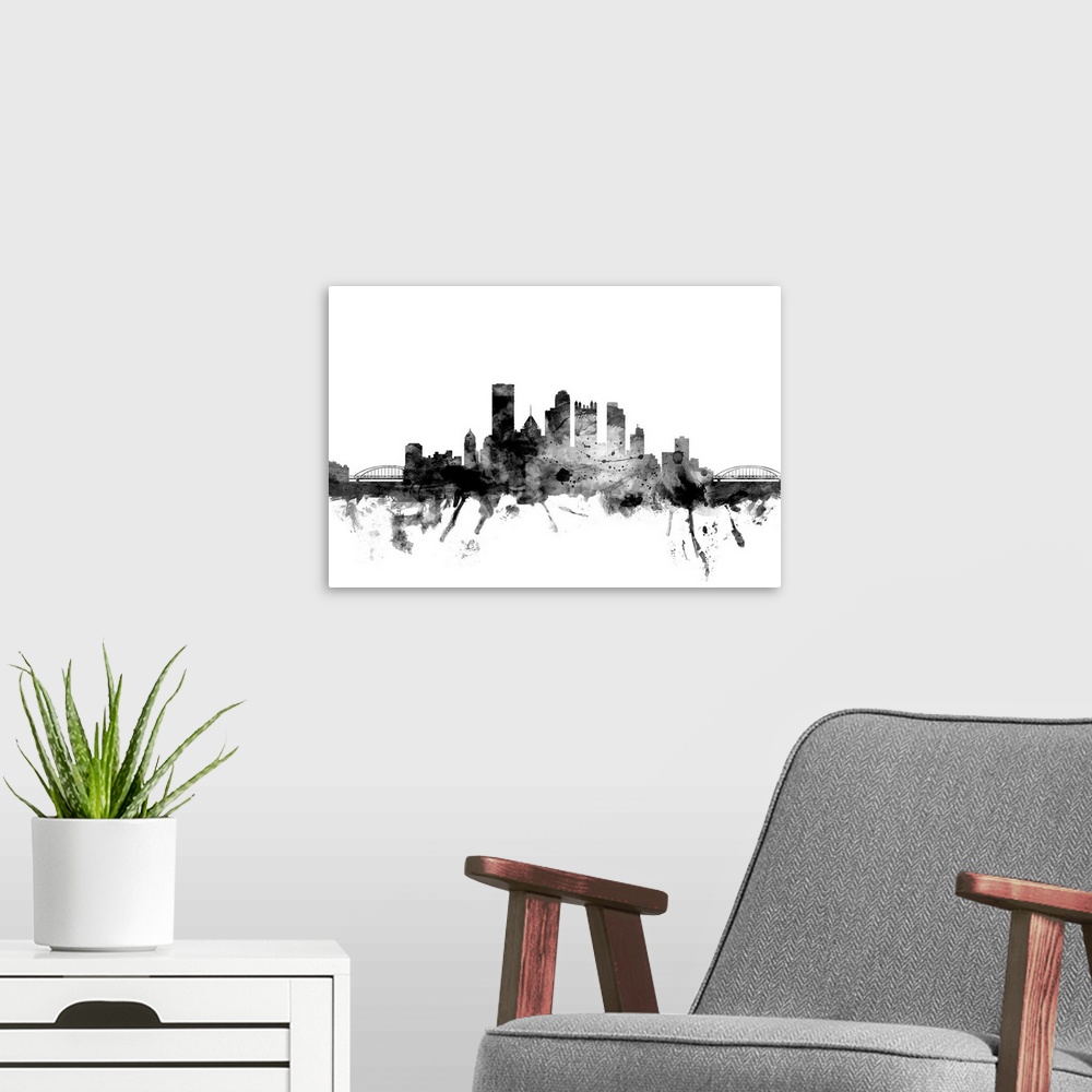 A modern room featuring Contemporary artwork of the Pittsburgh city skyline in black watercolor paint splashes.