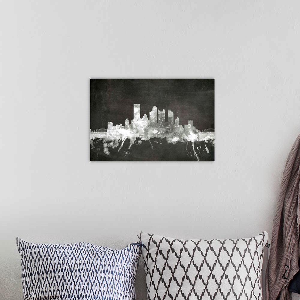 A bohemian room featuring Smokey dark watercolor silhouette of the Pittsburgh city skyline against chalkboard background.