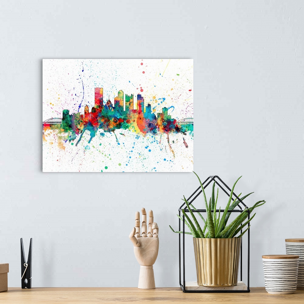 A bohemian room featuring Wild and vibrant paint splatter silhouette of the Pittsburgh skyline.