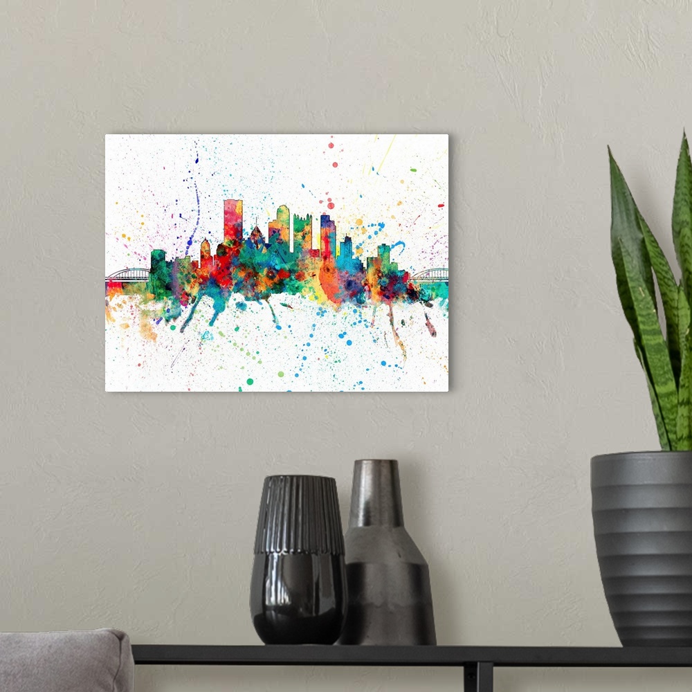 A modern room featuring Wild and vibrant paint splatter silhouette of the Pittsburgh skyline.