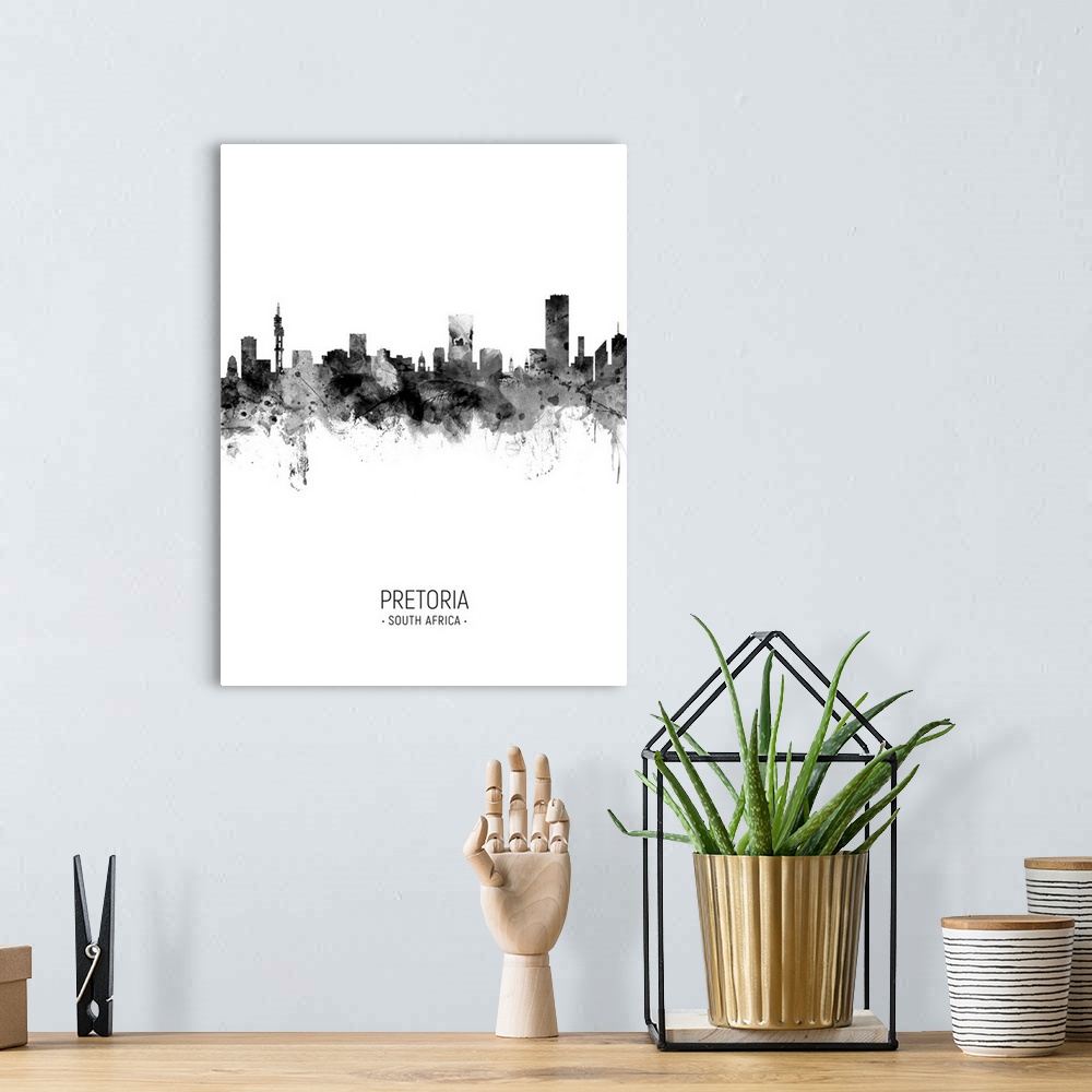A bohemian room featuring Watercolor art print of the skyline of Pretoria, South Africa.
