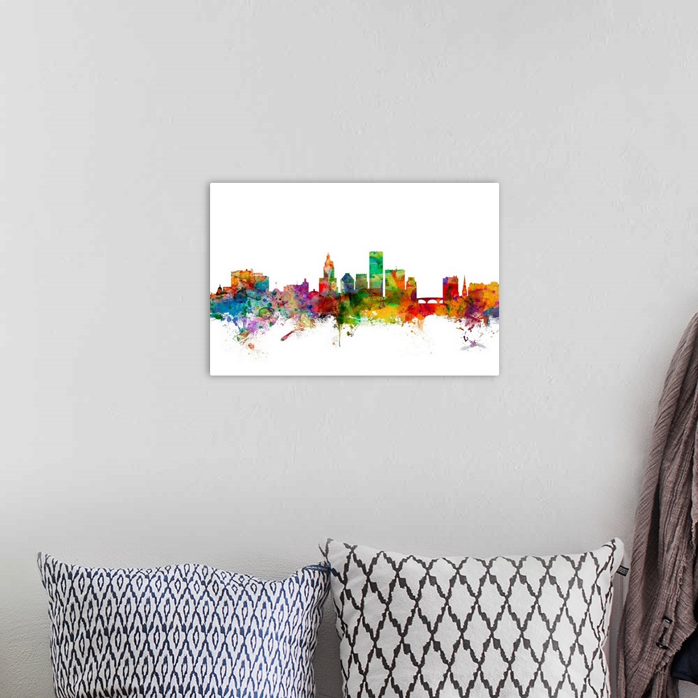 A bohemian room featuring Watercolor artwork of the Providence skyline against a white background.