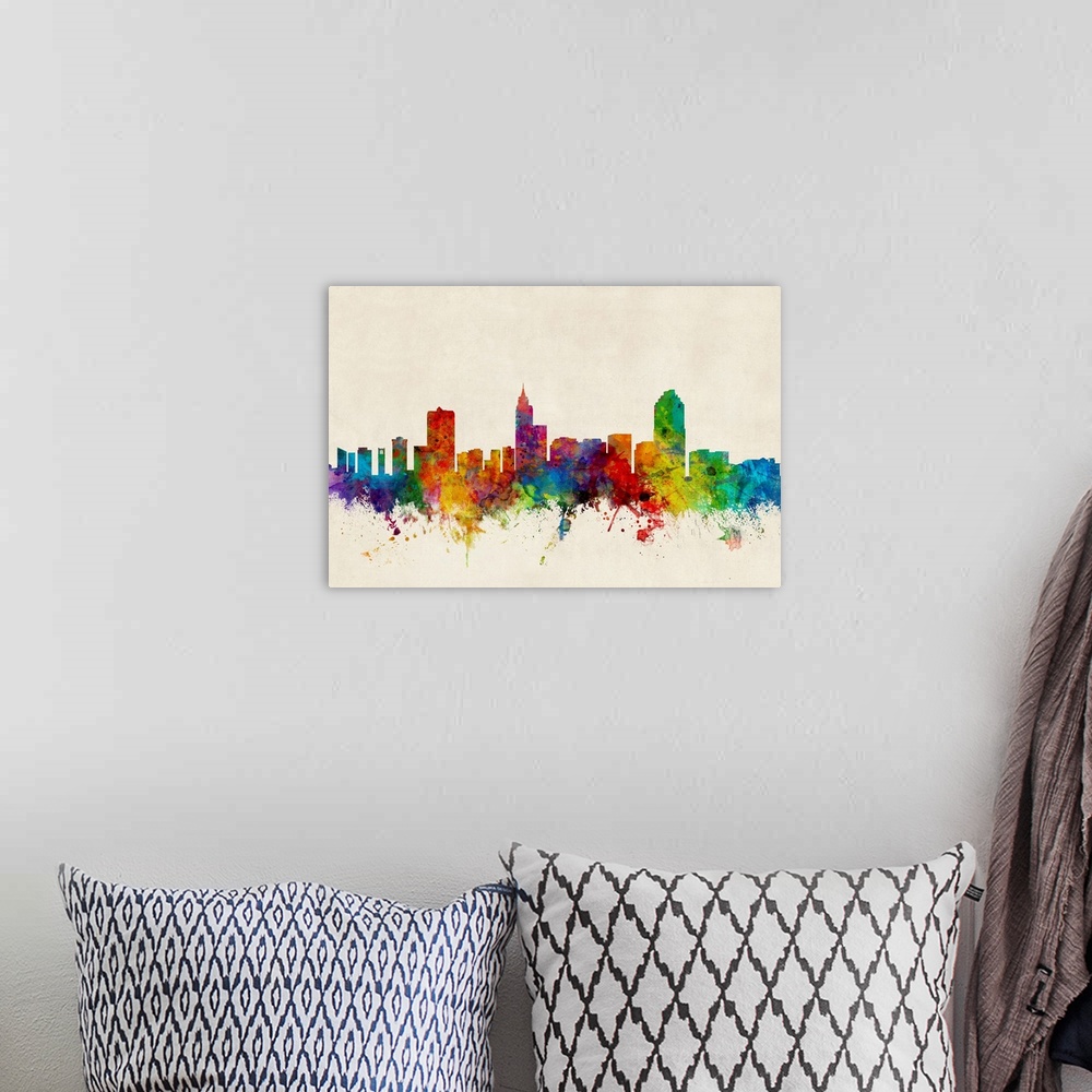 A bohemian room featuring A splattered and splashed watercolor silhouette of the Raleigh city skyline against a distressed ...