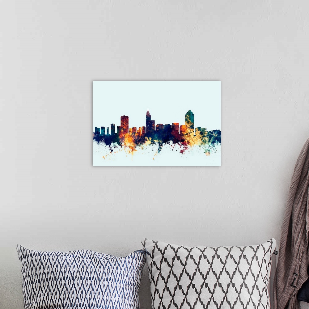 A bohemian room featuring Dark watercolor silhouette of the Raleigh city skyline against a light blue background.