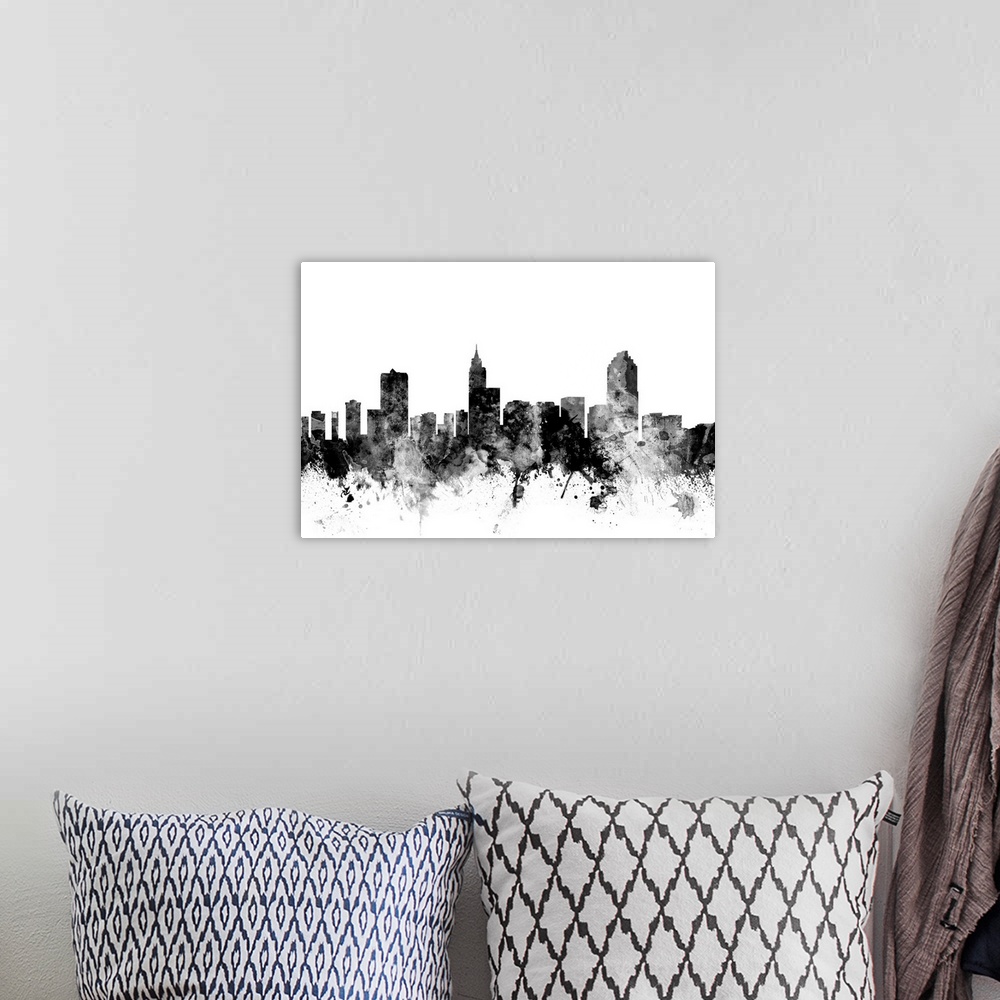 A bohemian room featuring Smokey dark watercolor silhouette of the Raleigh city skyline.