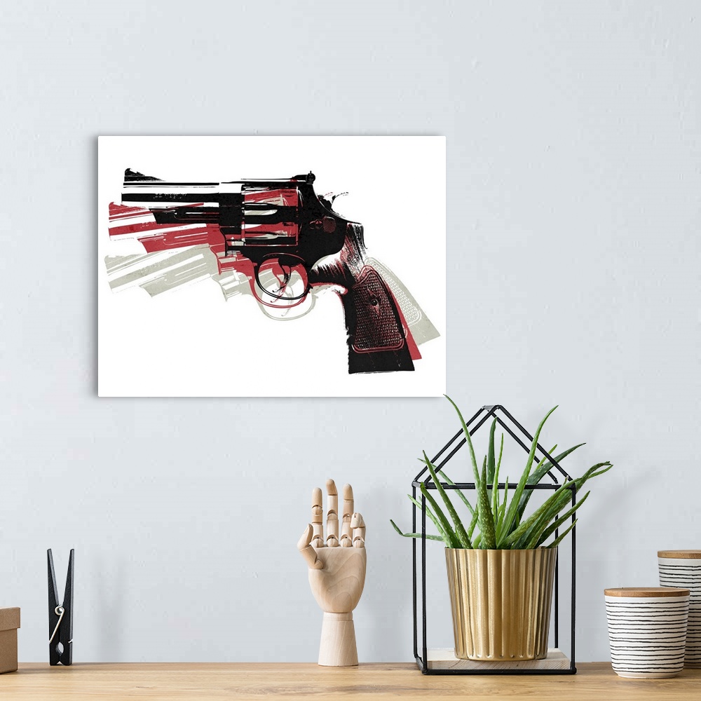 A bohemian room featuring Warhol inspired pop art of a revolver in three different colors and positions against a white bac...