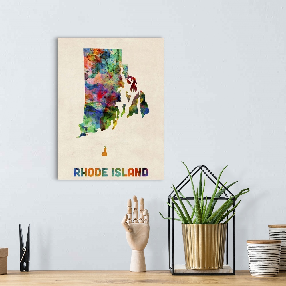 A bohemian room featuring Contemporary piece of artwork of a map of Rhode Island made up of watercolor splashes.