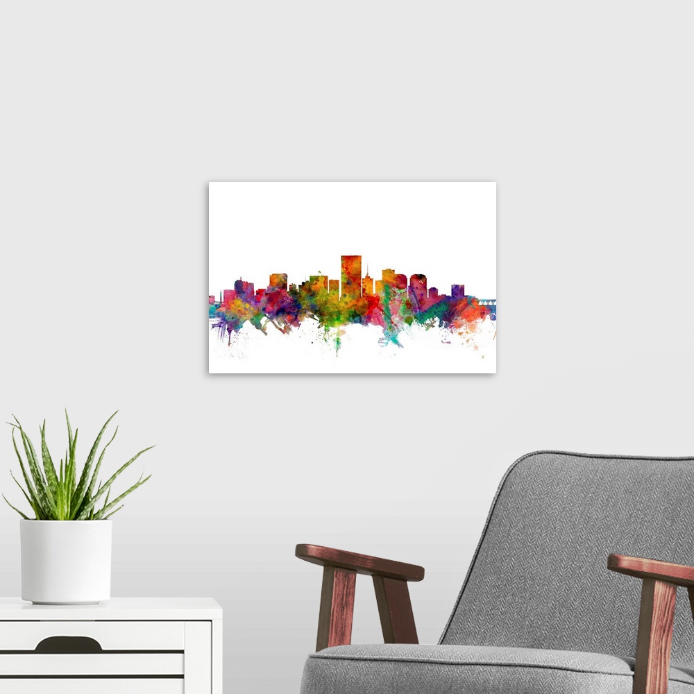 A modern room featuring Contemporary piece of artwork of the Richmond skyline made of colorful paint splashes.