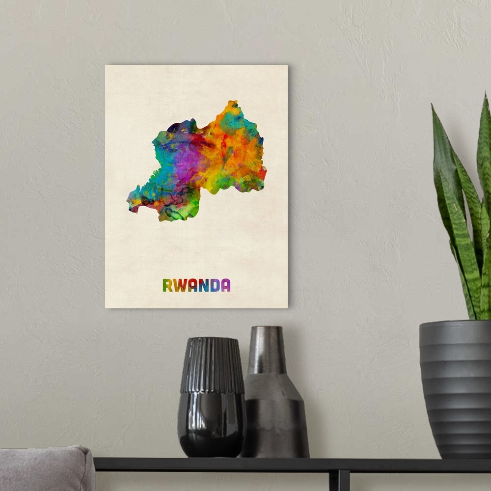 A modern room featuring Colorful watercolor art map of Rwanda against a distressed background.