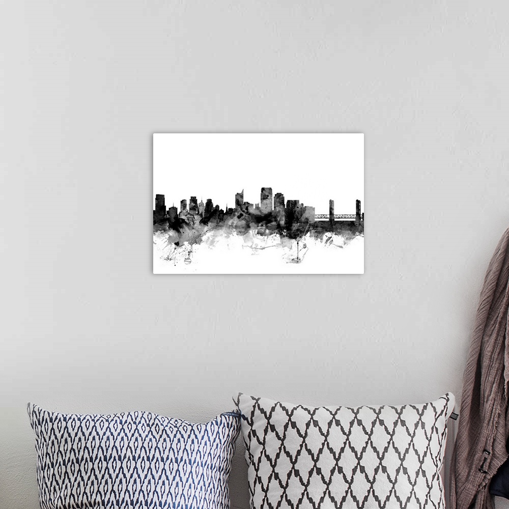 A bohemian room featuring Contemporary artwork of the Sacramento city skyline in black watercolor paint splashes.