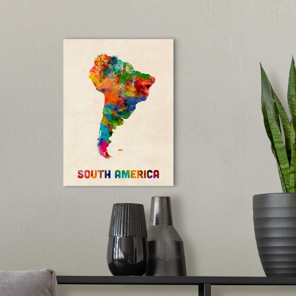 A modern room featuring A watercolor map of South America.