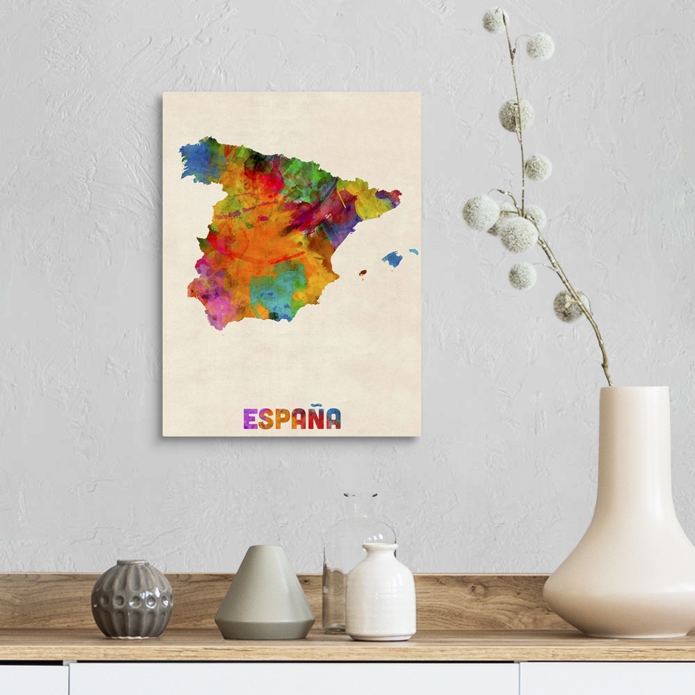 A farmhouse room featuring Contemporary piece of artwork of a map of Espana made up of watercolor splashes.