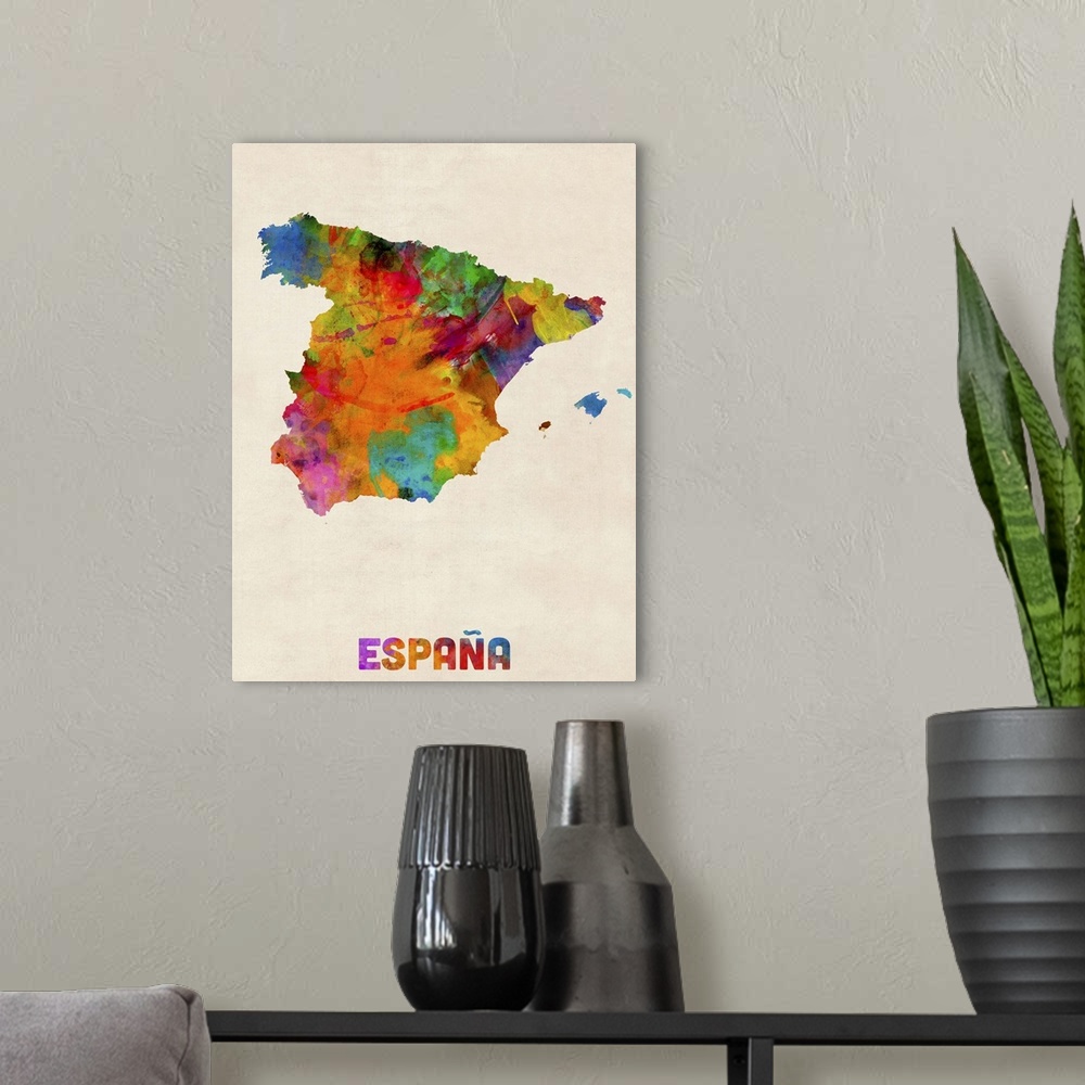 A modern room featuring Contemporary piece of artwork of a map of Espana made up of watercolor splashes.