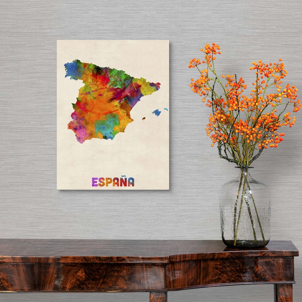 A traditional room featuring Contemporary piece of artwork of a map of Espana made up of watercolor splashes.