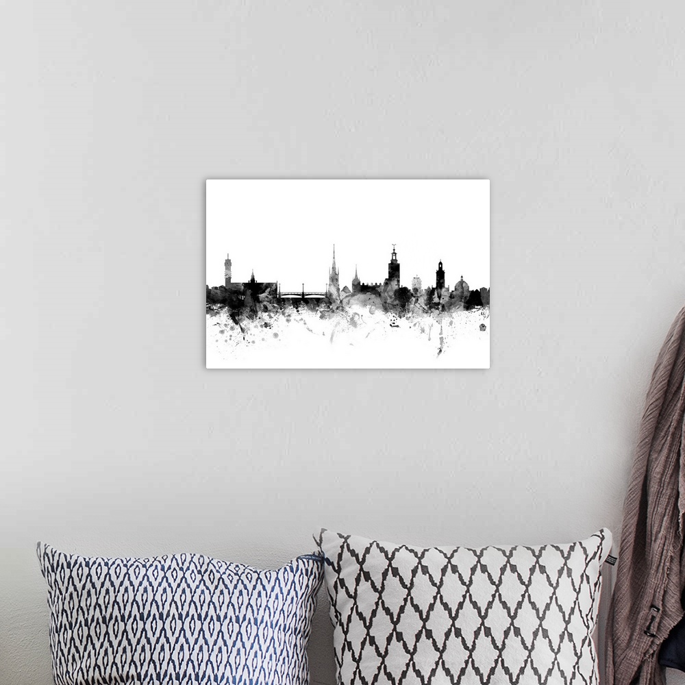 A bohemian room featuring Contemporary artwork of the Stockholm city skyline in black watercolor paint splashes.