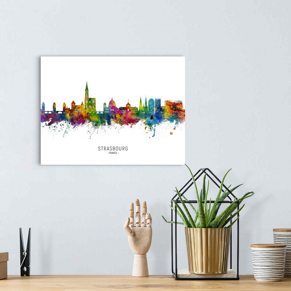 A bohemian room featuring Watercolor art print of the skyline of Strasbourg, France