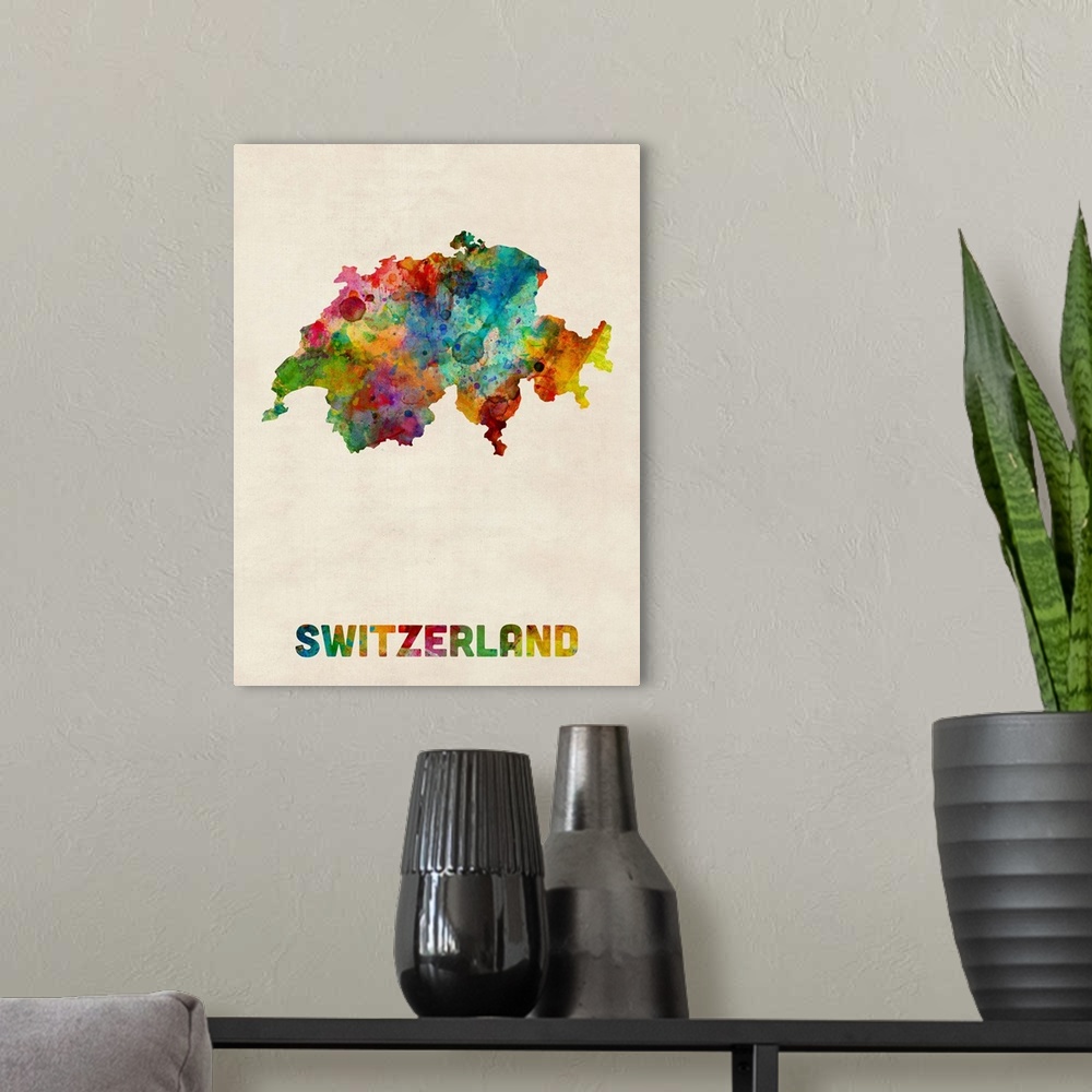 A modern room featuring Contemporary piece of artwork of a map of Switzerland made up of watercolor splashes.