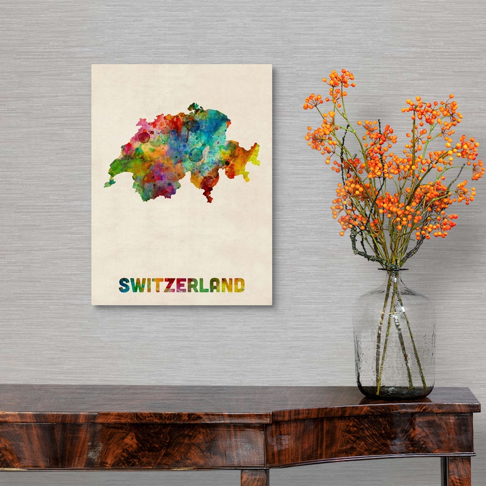 A traditional room featuring Contemporary piece of artwork of a map of Switzerland made up of watercolor splashes.