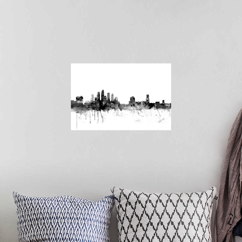 A bohemian room featuring Smokey dark watercolor silhouette of the Tampa city skyline.