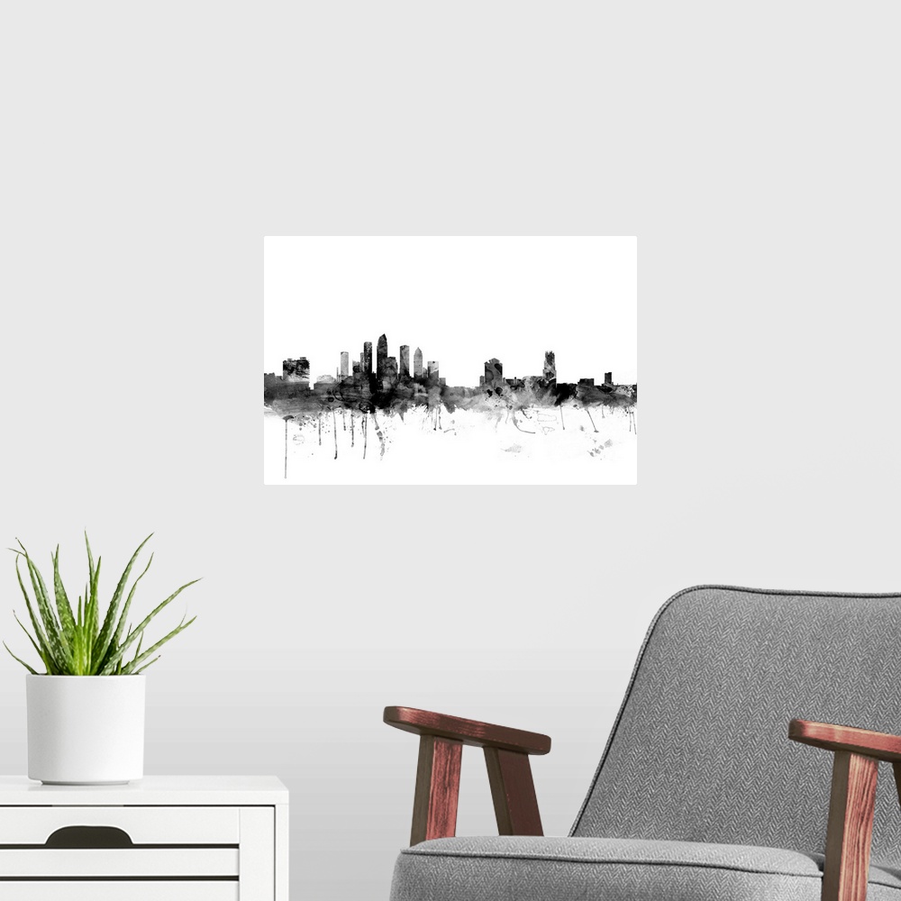 A modern room featuring Smokey dark watercolor silhouette of the Tampa city skyline.