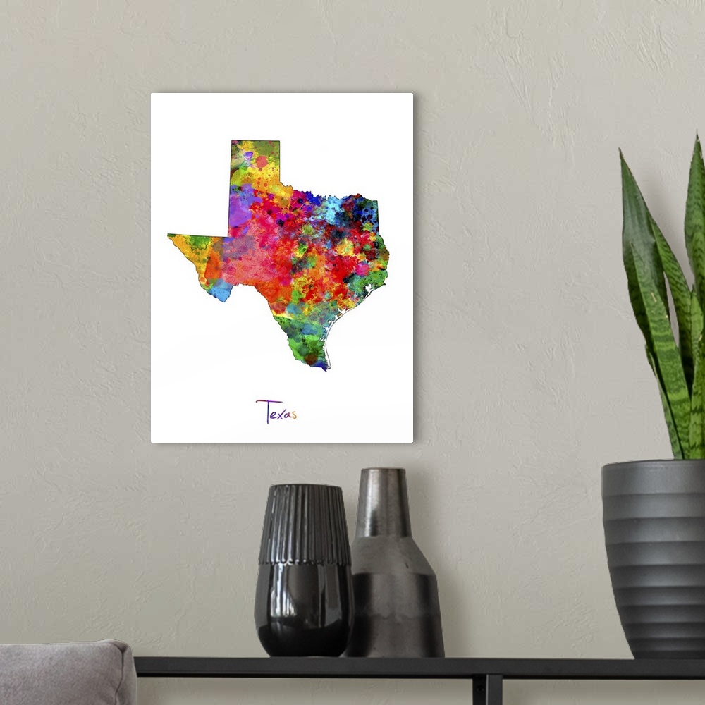 A modern room featuring Contemporary artwork of a map of Texas made of colorful paint splashes.