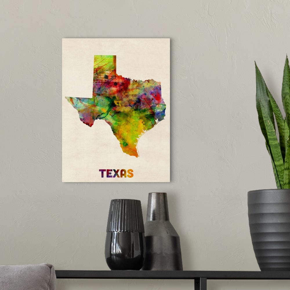 A modern room featuring Contemporary piece of artwork of a map of Texas made up of watercolor splashes.
