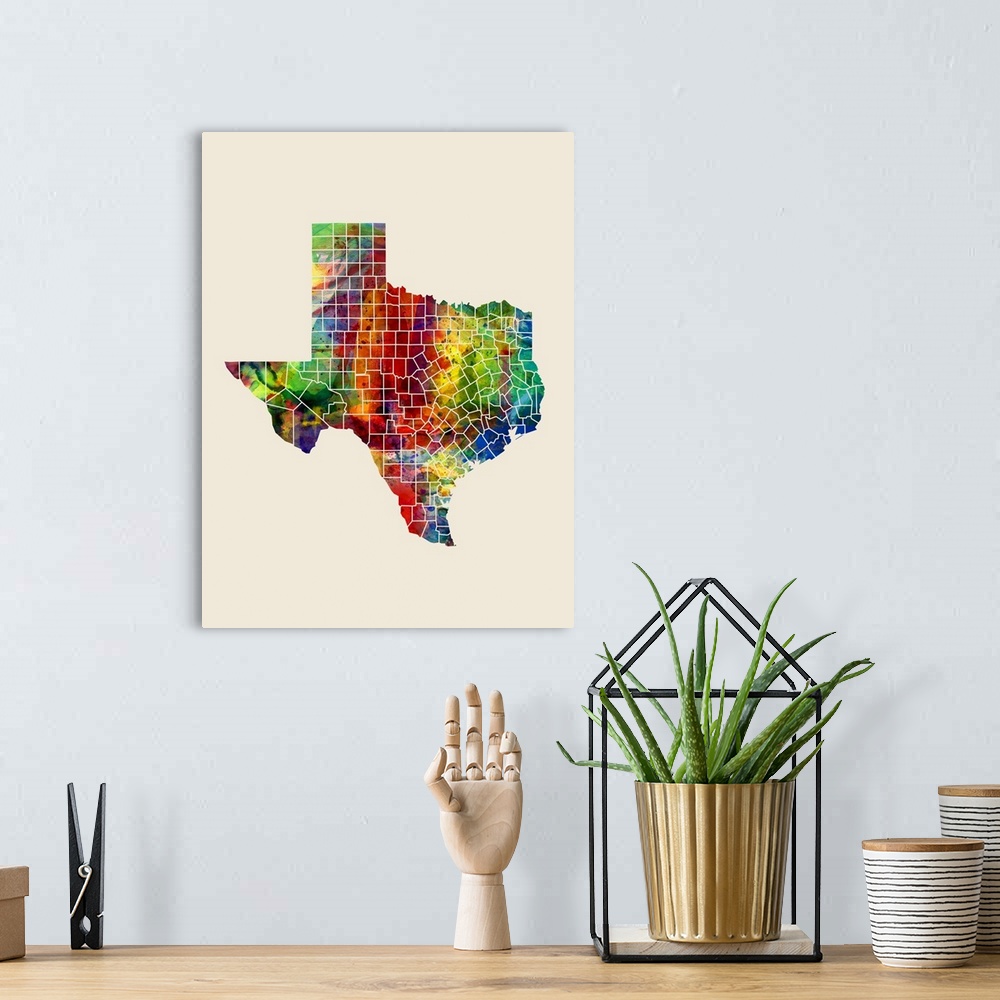 A bohemian room featuring A watercolor map of Texas, United States, featuring country borders
