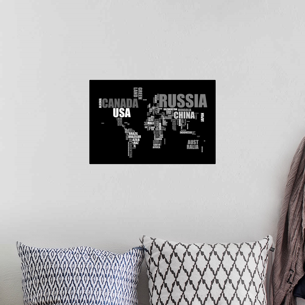 A bohemian room featuring Huge, horizontal, typography canvas art of the world map made up of the names of each country. On...