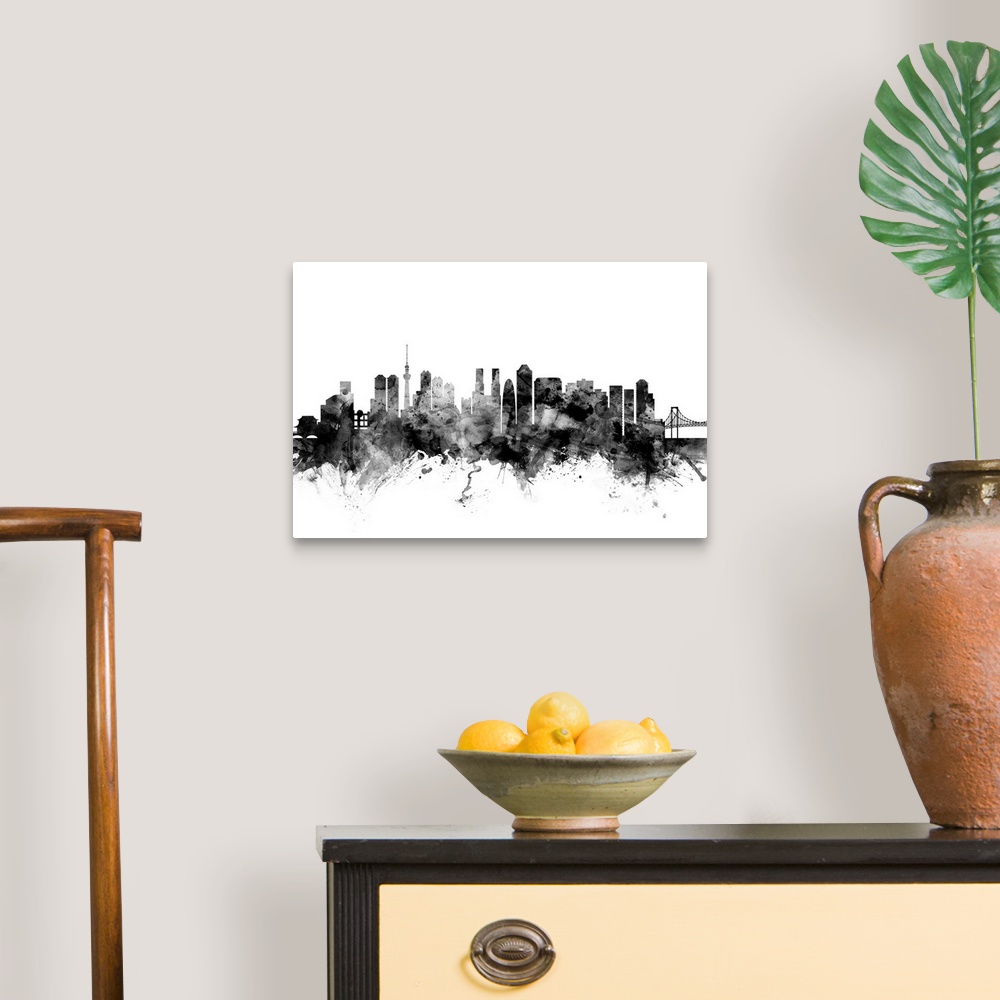 A traditional room featuring Contemporary artwork of the Tokyo city skyline in black watercolor paint splashes.