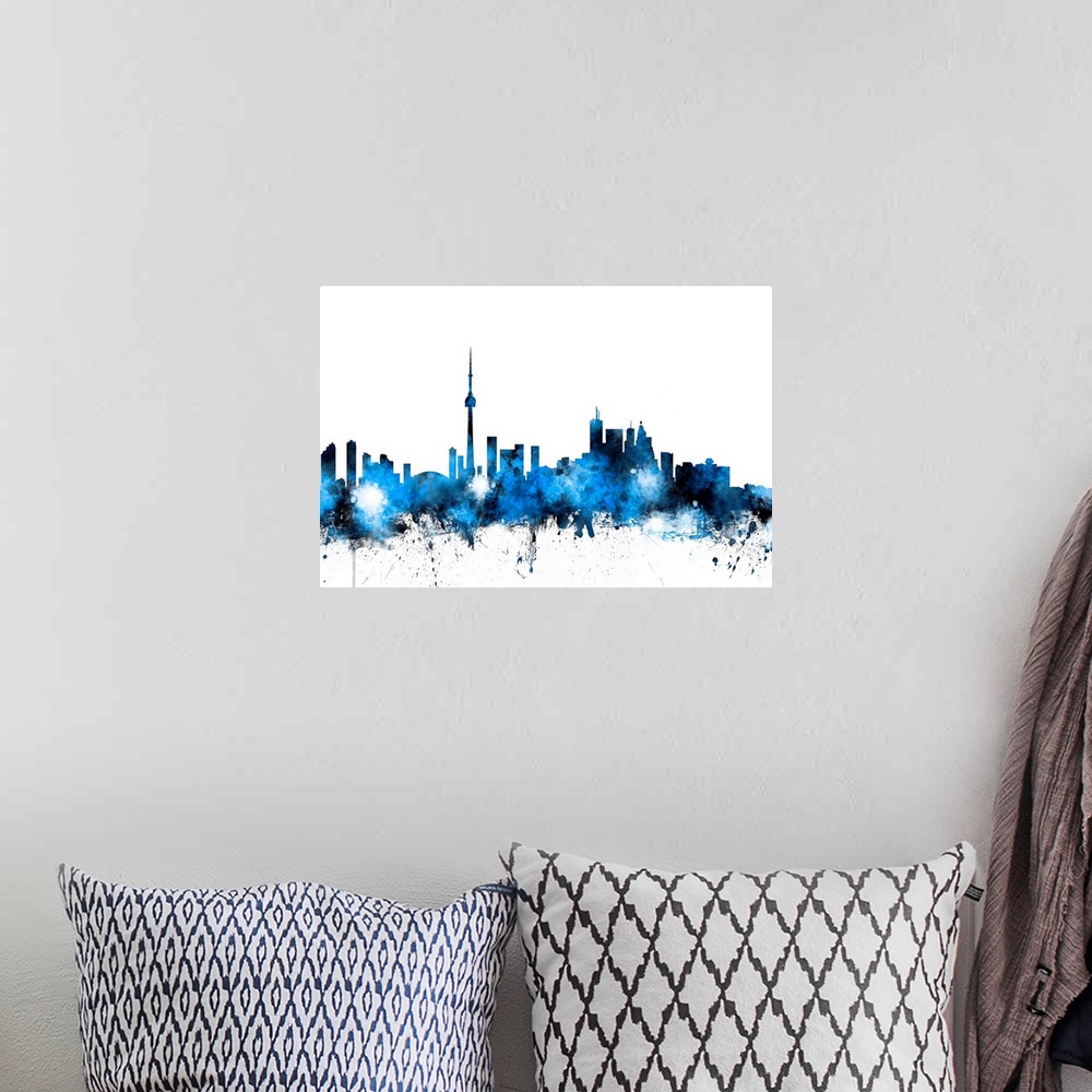 A bohemian room featuring Watercolor artwork of the Toronto skyline against a white background.