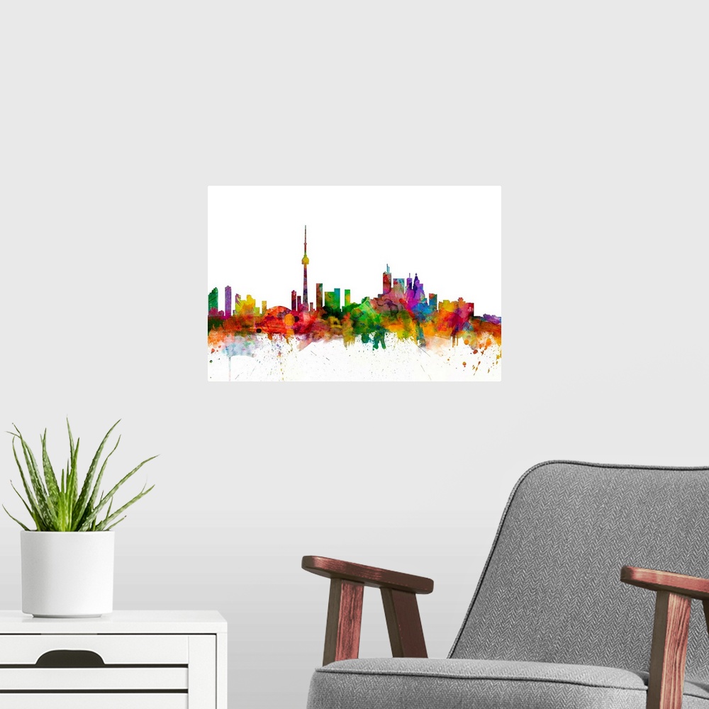 A modern room featuring Watercolor artwork of the Toronto skyline against a white background.