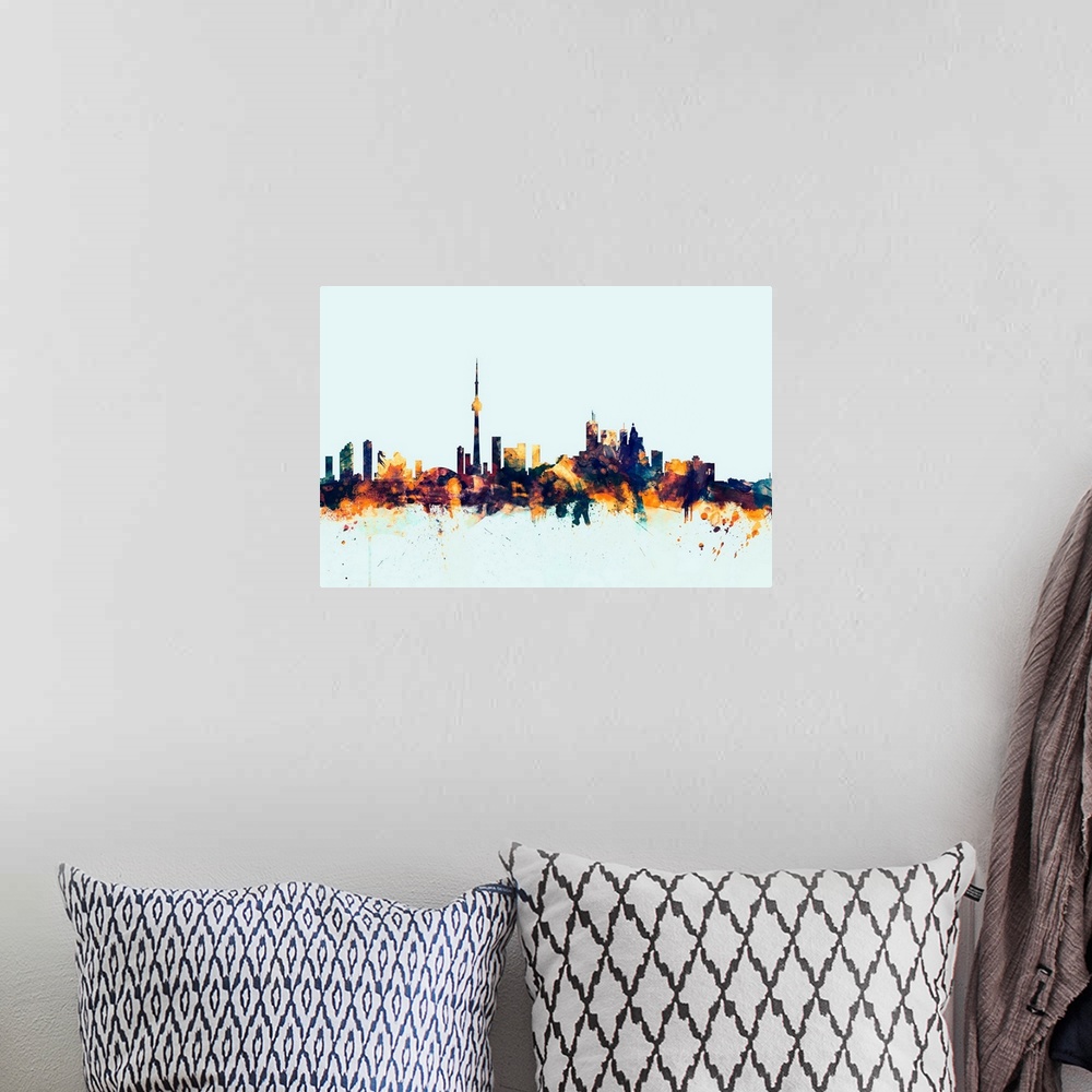 A bohemian room featuring Dark watercolor silhouette of the Toronto city skyline against a light blue background.