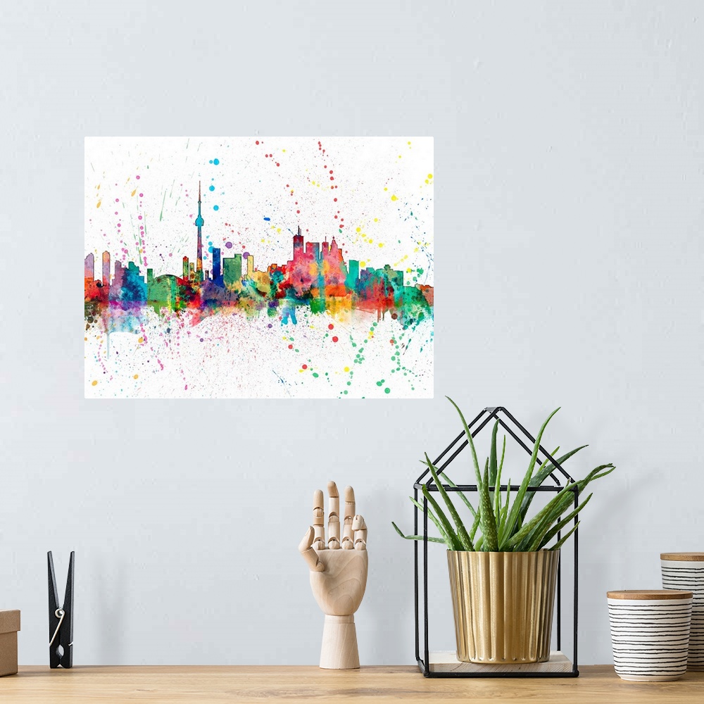 A bohemian room featuring Wild and vibrant paint splatter silhouette of the Toronto skyline.