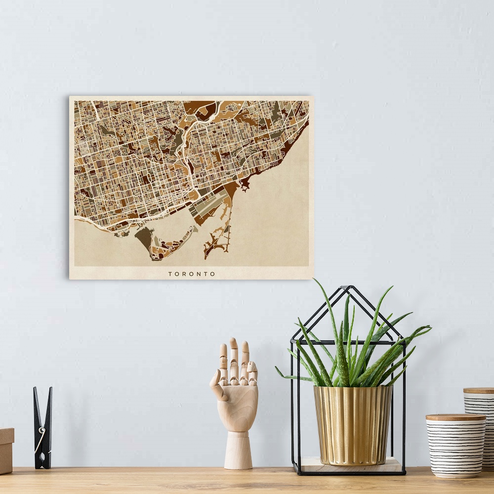 A bohemian room featuring Art map of Toronto city streets.
