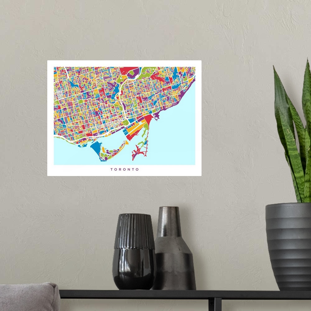 A modern room featuring Watercolor art map of Toronto city streets.