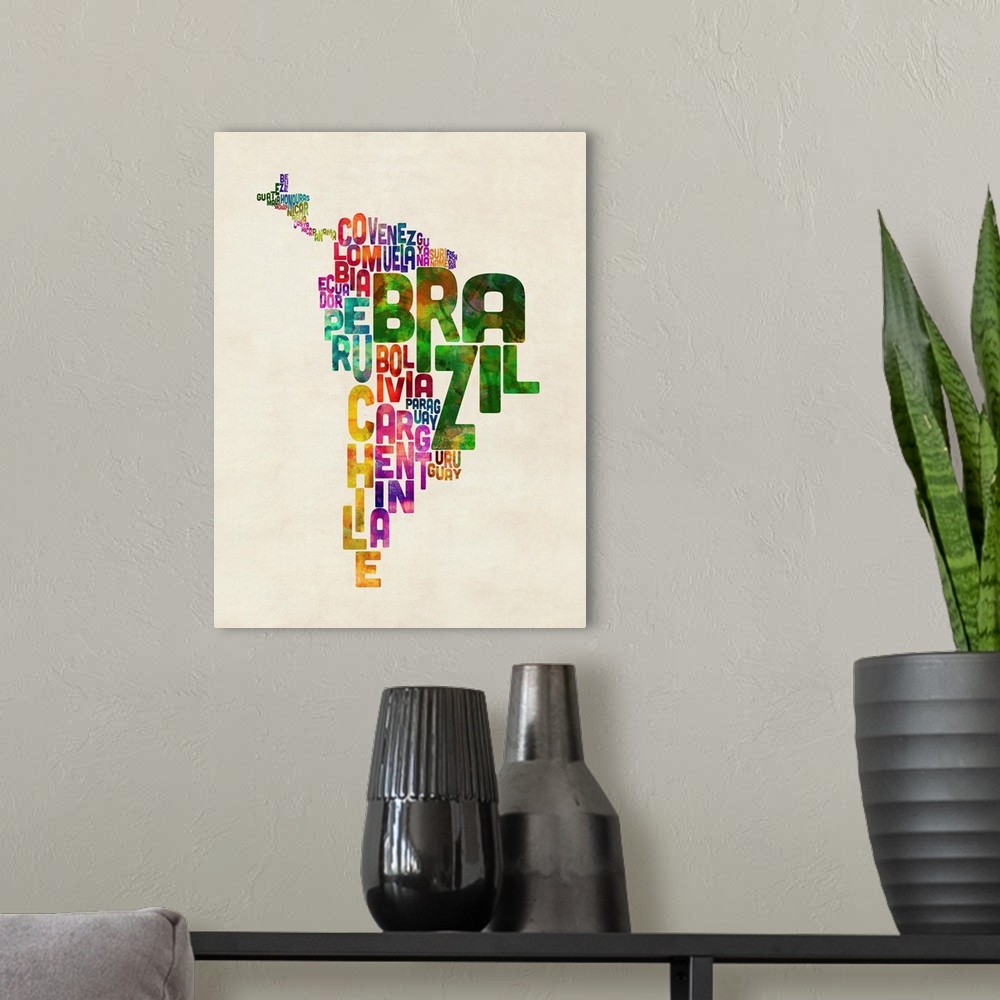 A modern room featuring A typographic text map of Central and South America in an urban watercolor style. Each country is...