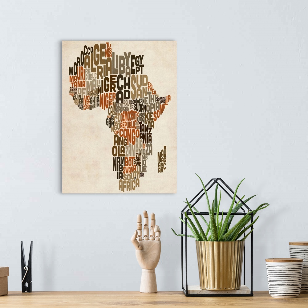 A bohemian room featuring Typography Text Map of Africa