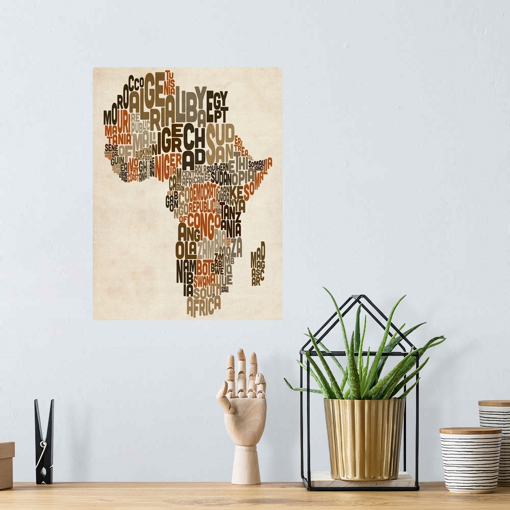 A bohemian room featuring Typography Text Map of Africa