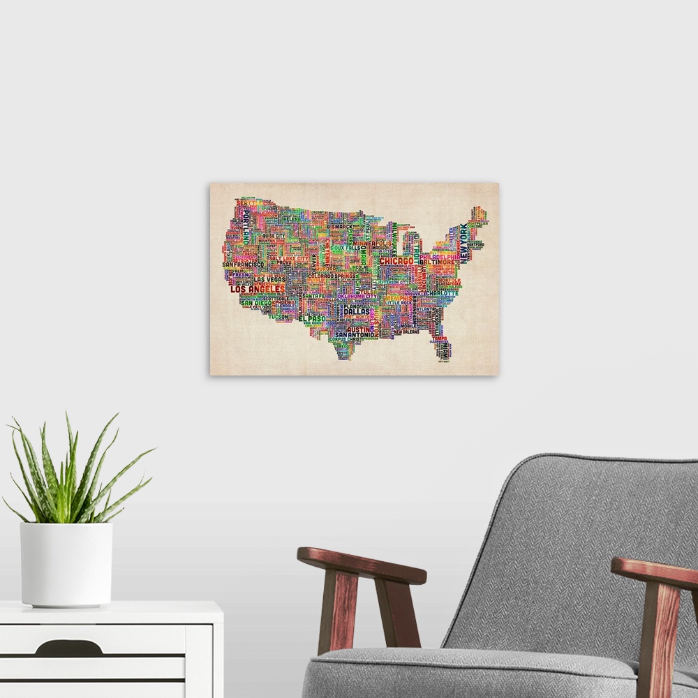 A modern room featuring Colorful map of America constructed using the names of each U.S. city.