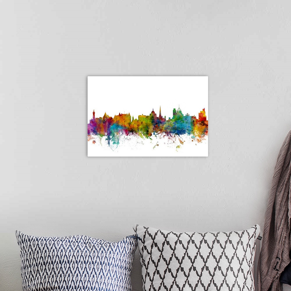 A bohemian room featuring Watercolor artwork of the Victoria skyline against a white background.