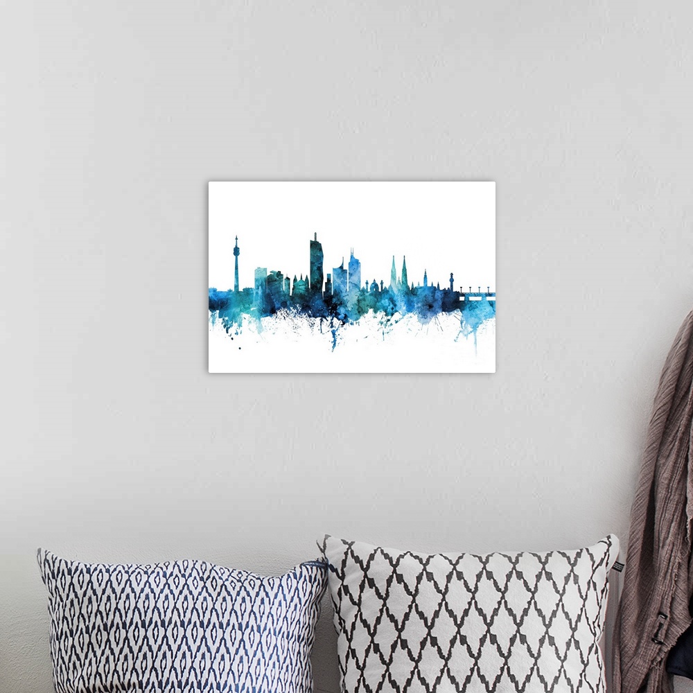 A bohemian room featuring Watercolor art print of the skyline of Vienna, Austria.