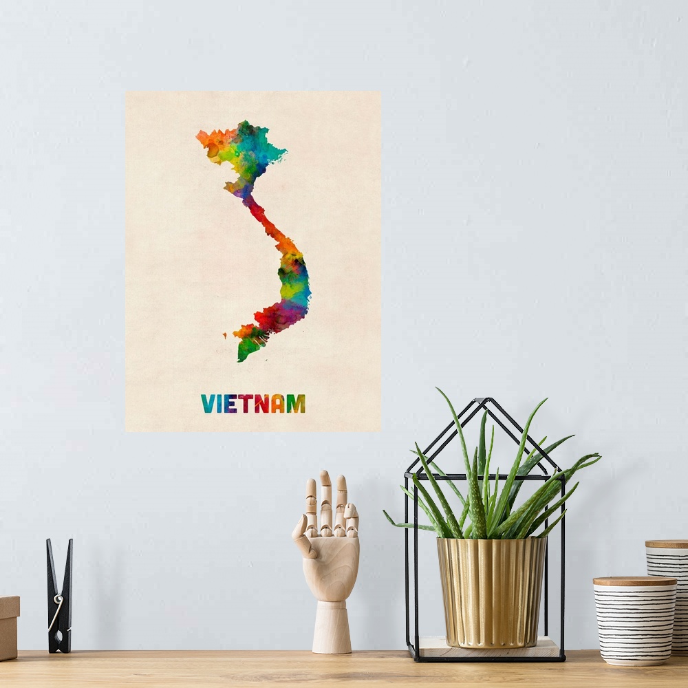A bohemian room featuring Colorful watercolor art map of Vietnam against a distressed background.
