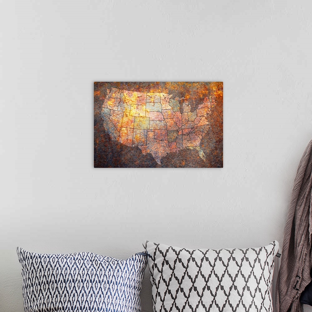 A bohemian room featuring Grungy canvas of a map of the United States of America with the states painted various colors.