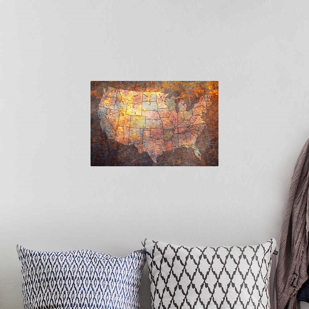 A bohemian room featuring Grungy canvas of a map of the United States of America with the states painted various colors.